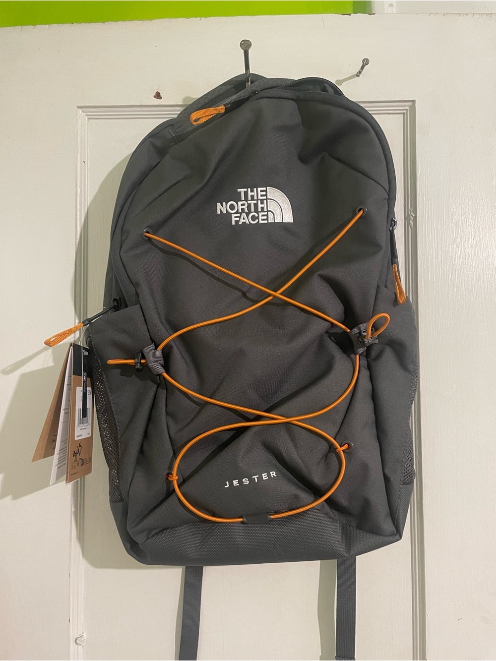 The North Face Jester Backpack in Charcoal with Orange Accents